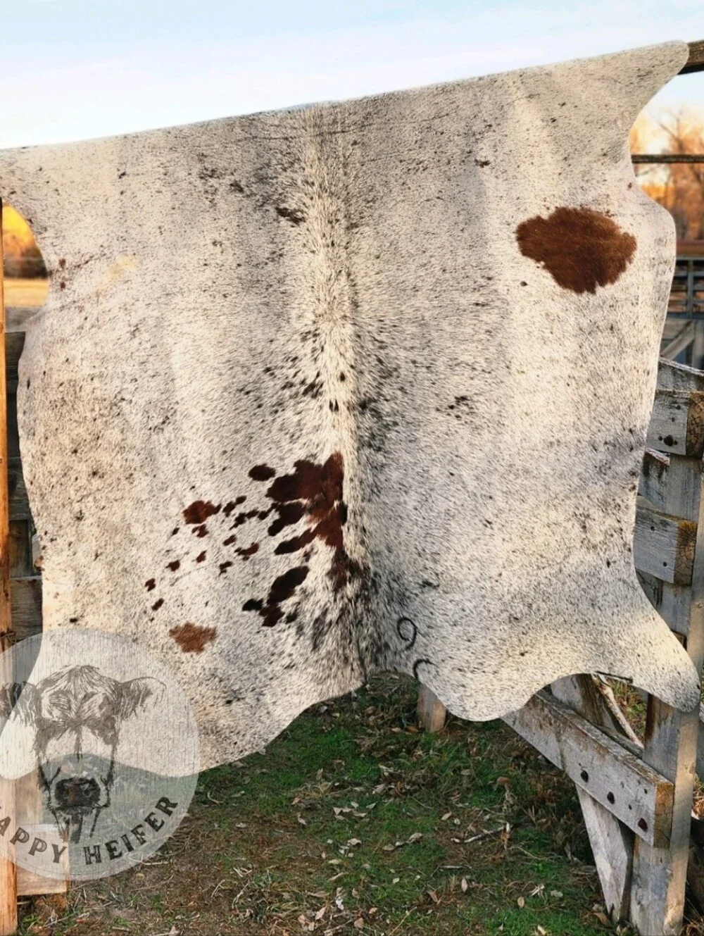 Stunning Brazilian Gray, Black and Brown Splatter Cowhide Rug.